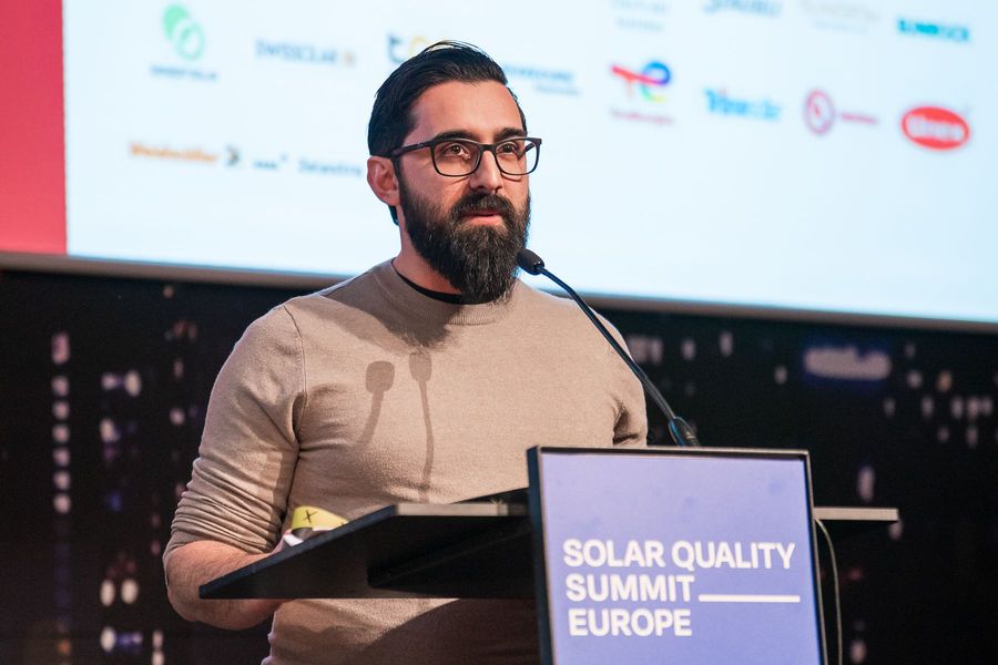 Călin Sas speaking at a solar conference
